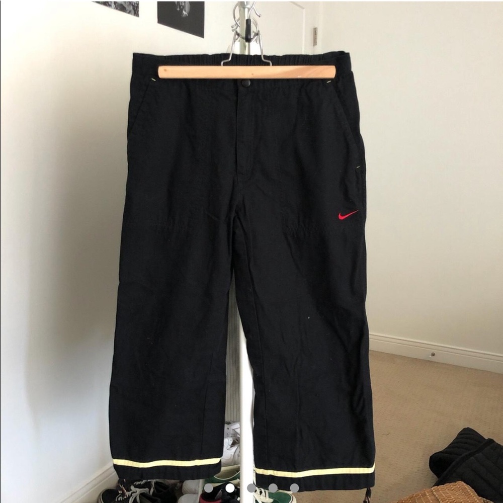 Nike pants with drawstrings for
waist and at bottom of the pants